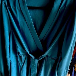 XXL long sleeves wrapped blouse. Brand new. Dark blue turquoise is the color!
